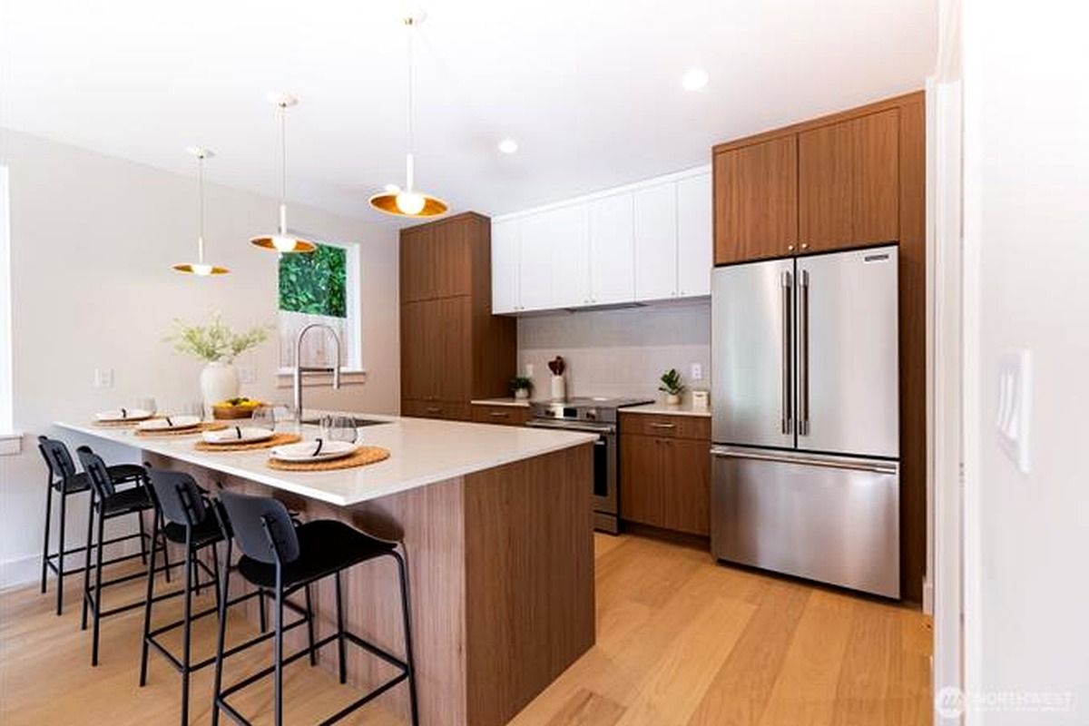 Kitchen with walnut cabinets and island