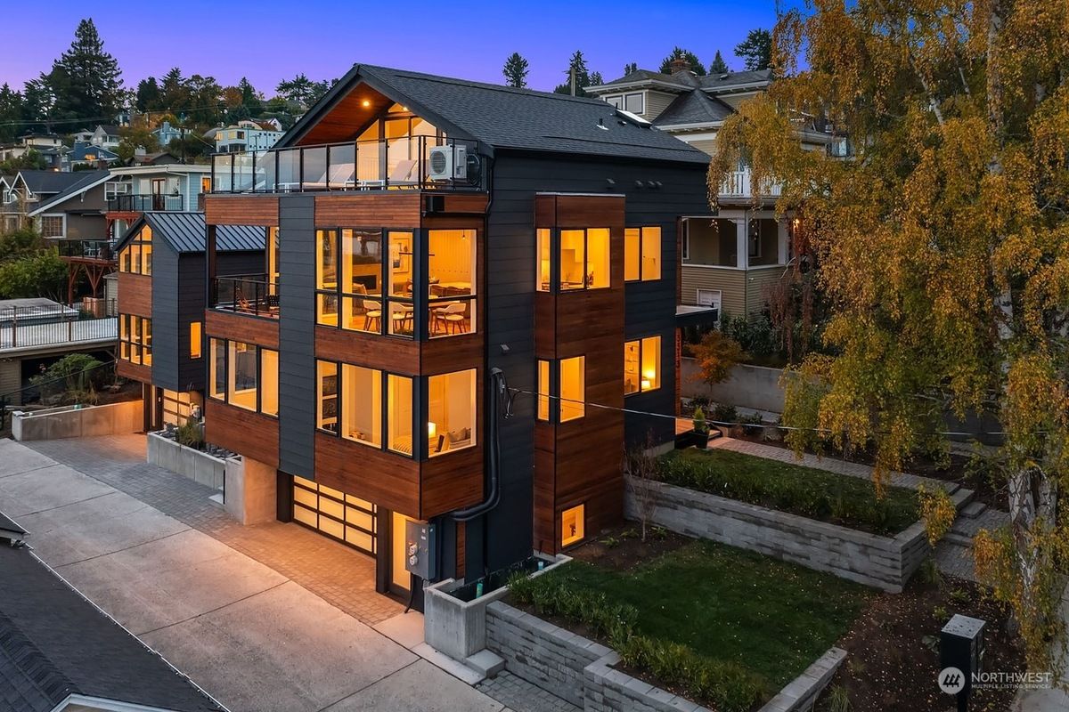 Leschi home lit up at dusk