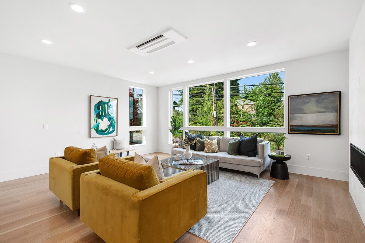 Living room with lake and mountain views