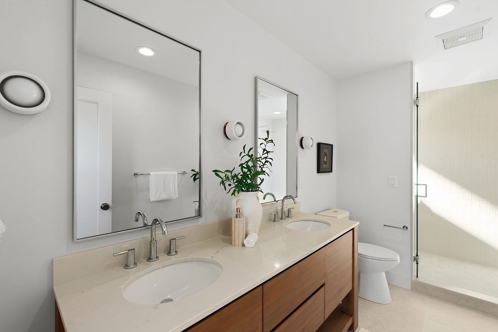 Bathroom with double walnut vanity
